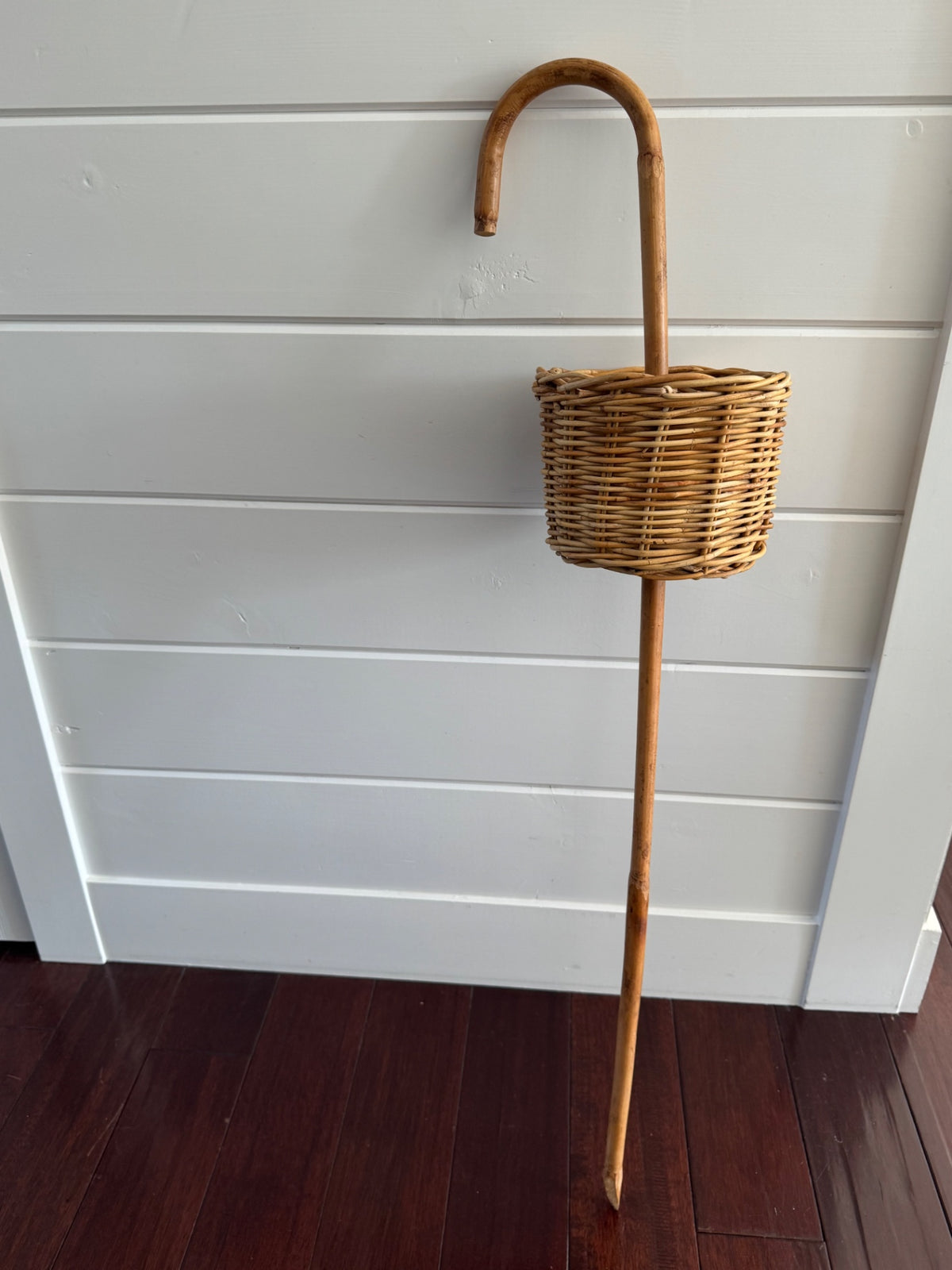foraging cane  / walking stick with an attached basket