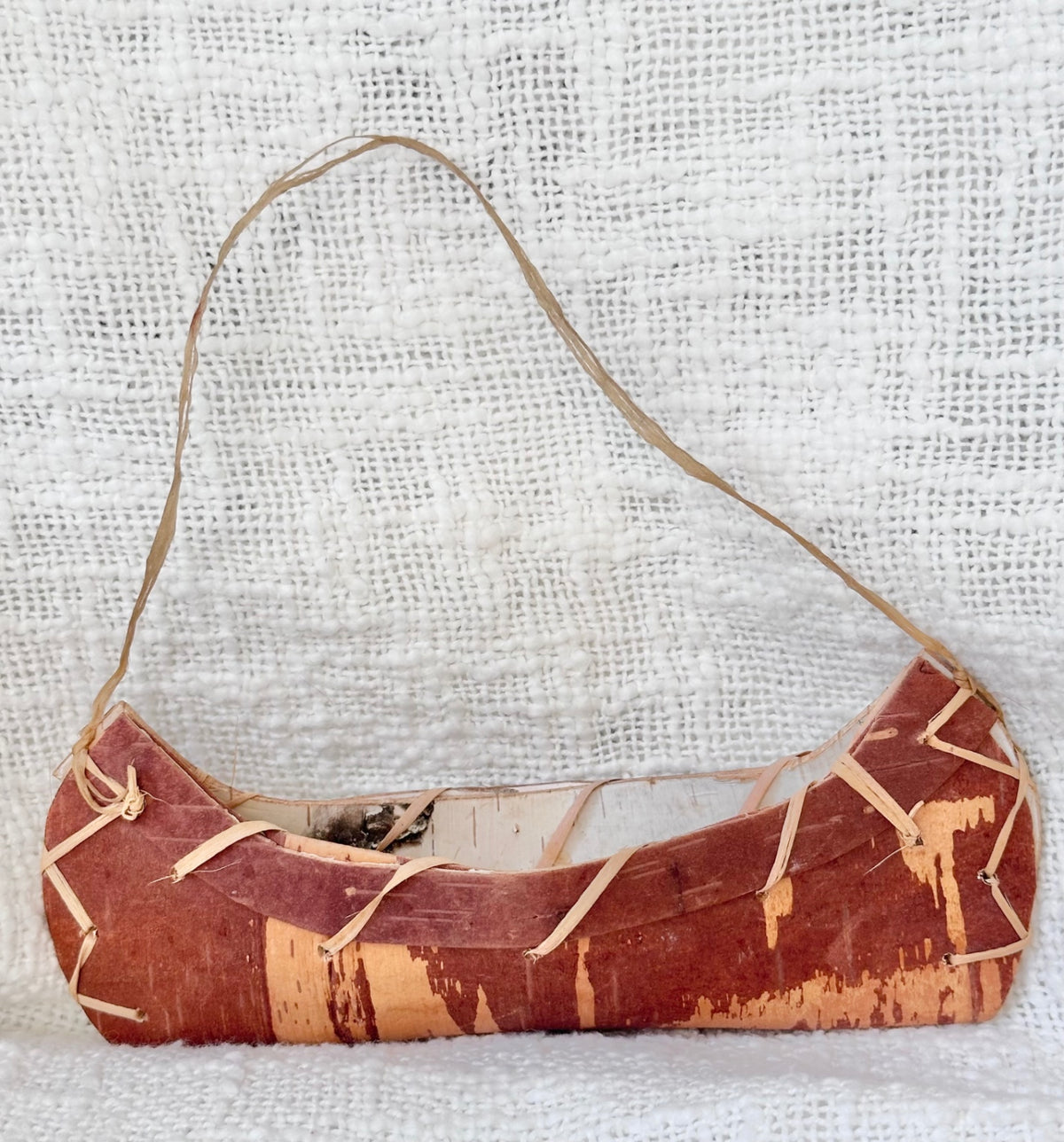 Vintage handmade birch bark canoe