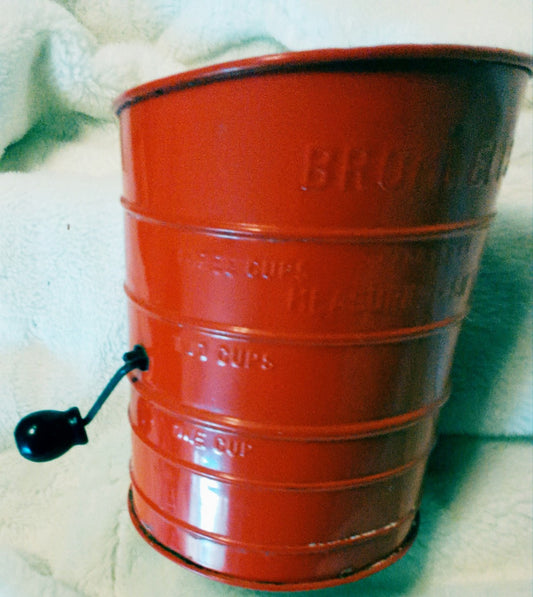 Bright Orange Vintage Sifter