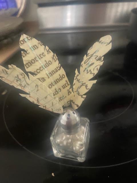 Feathers in Small Jar 
