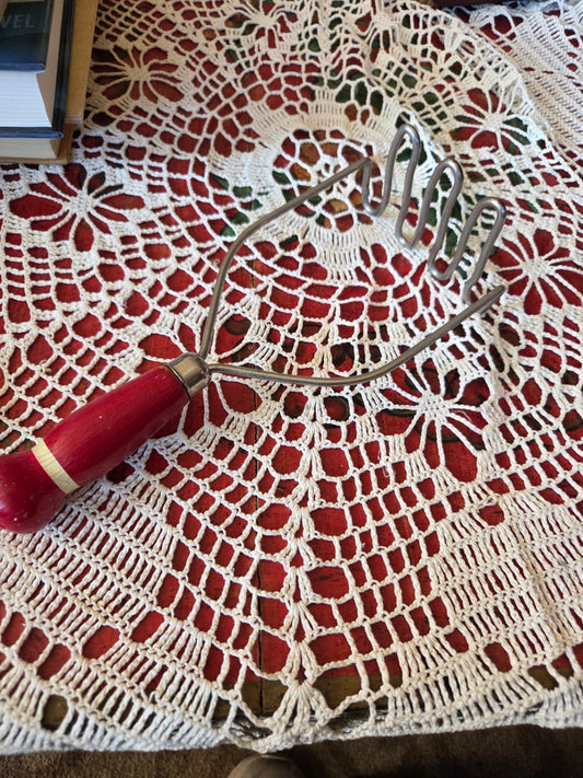 Vintage potato masher