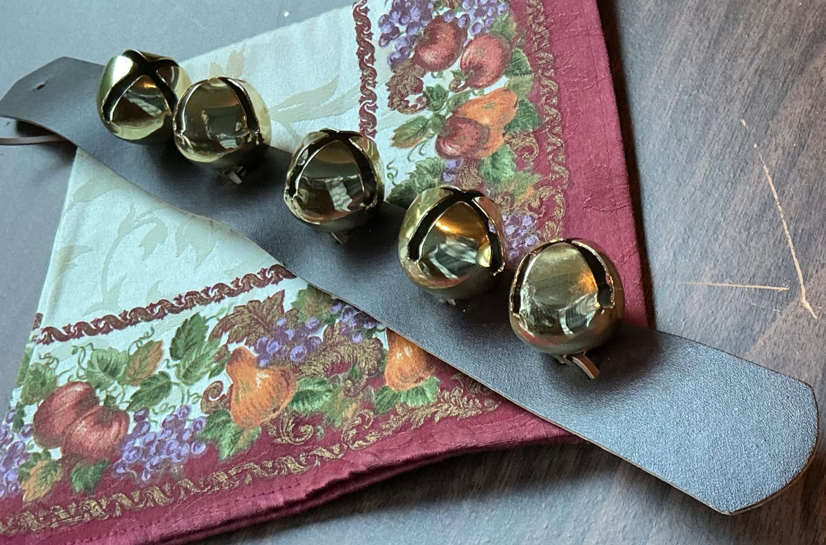 JINGLE BELLS ON A LEATHER STRAP