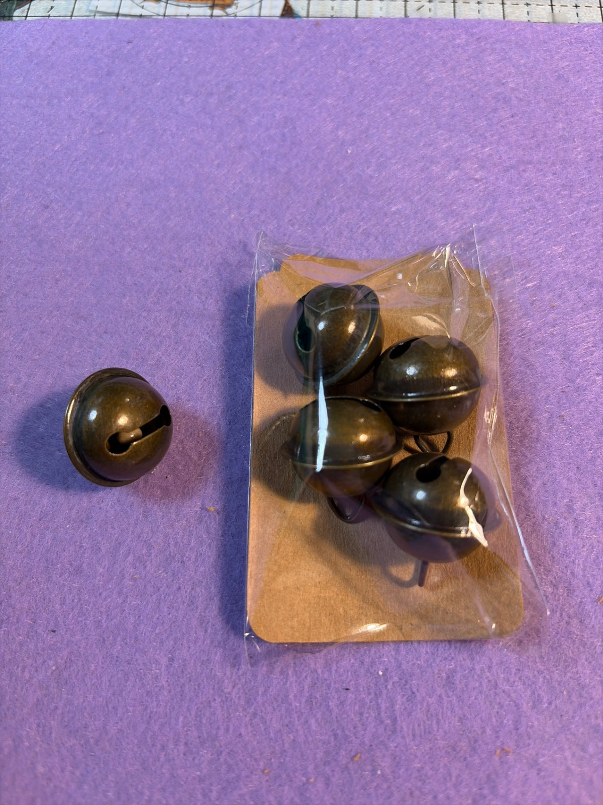 Set of (4) ~1” metal bells