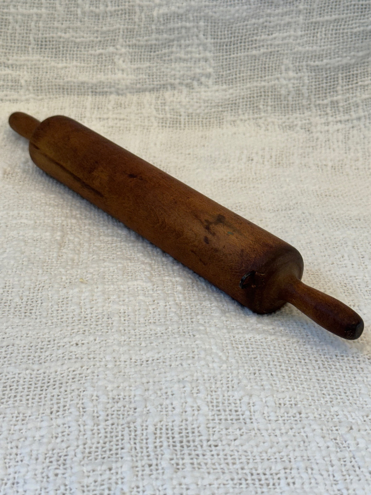 Childs late l9th century wood rolling pin.