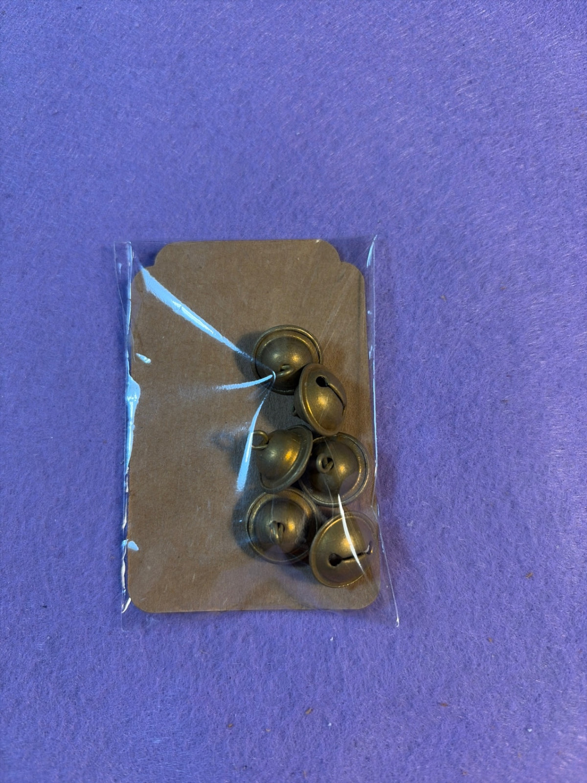 Set of (6) brass 1/2” vintage bells