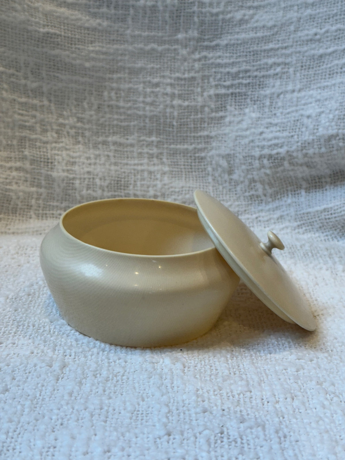 Antique round cellulord powder box 