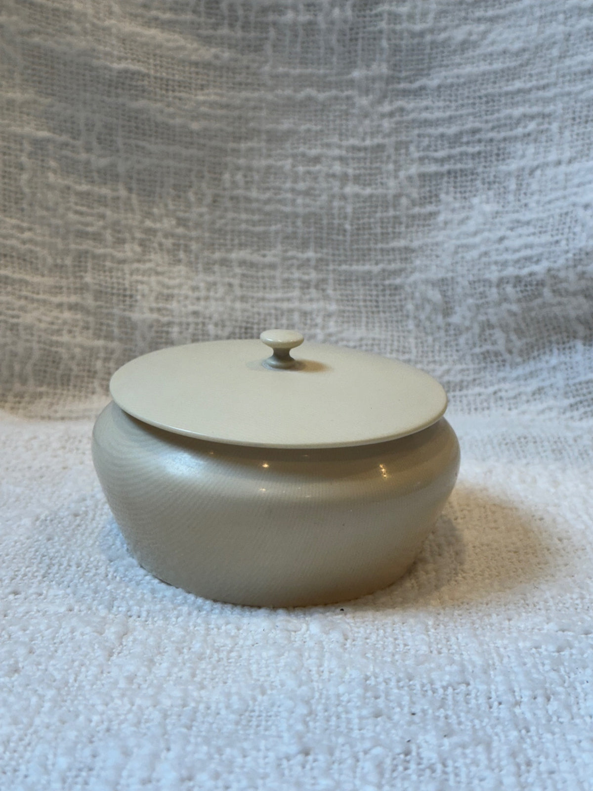 Antique round cellulord powder box 