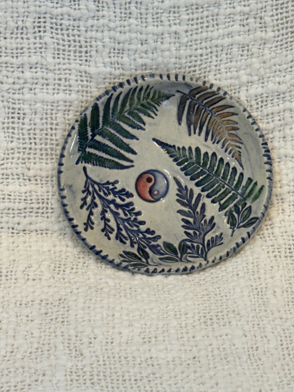 Handmade pottery trinket dish w/ ferns & yin-yang symbol 