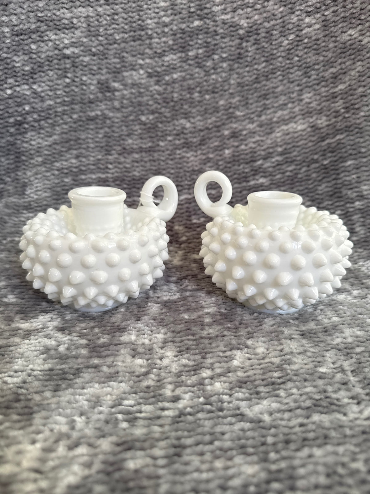 Pair of Fenton milk glass hobnail candle holders  