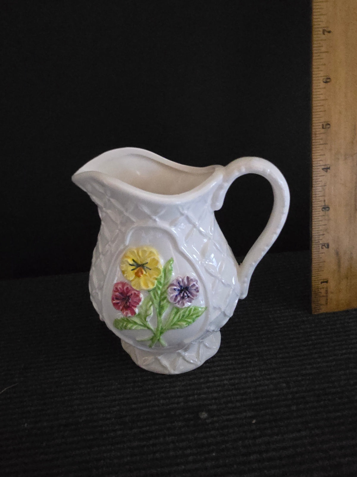 Pitcher with flowers