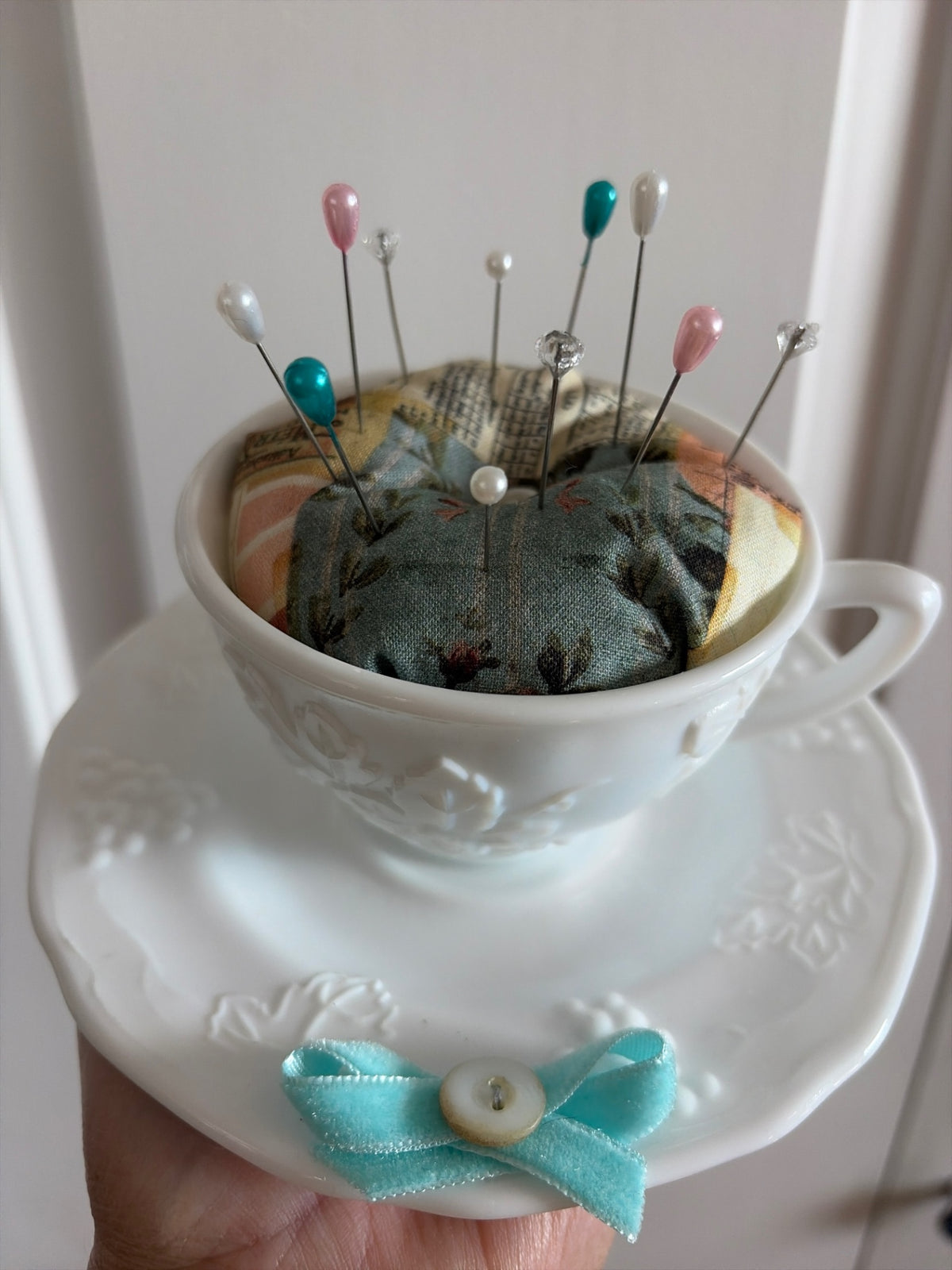 Handmade pin cushion in White Milkglass teacup