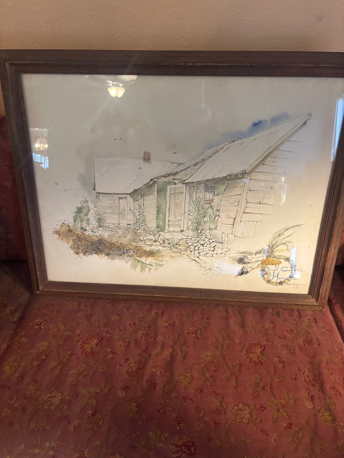 Large wood framed water color. Titled Bull Corn House. Signed-Native artist New Mexico