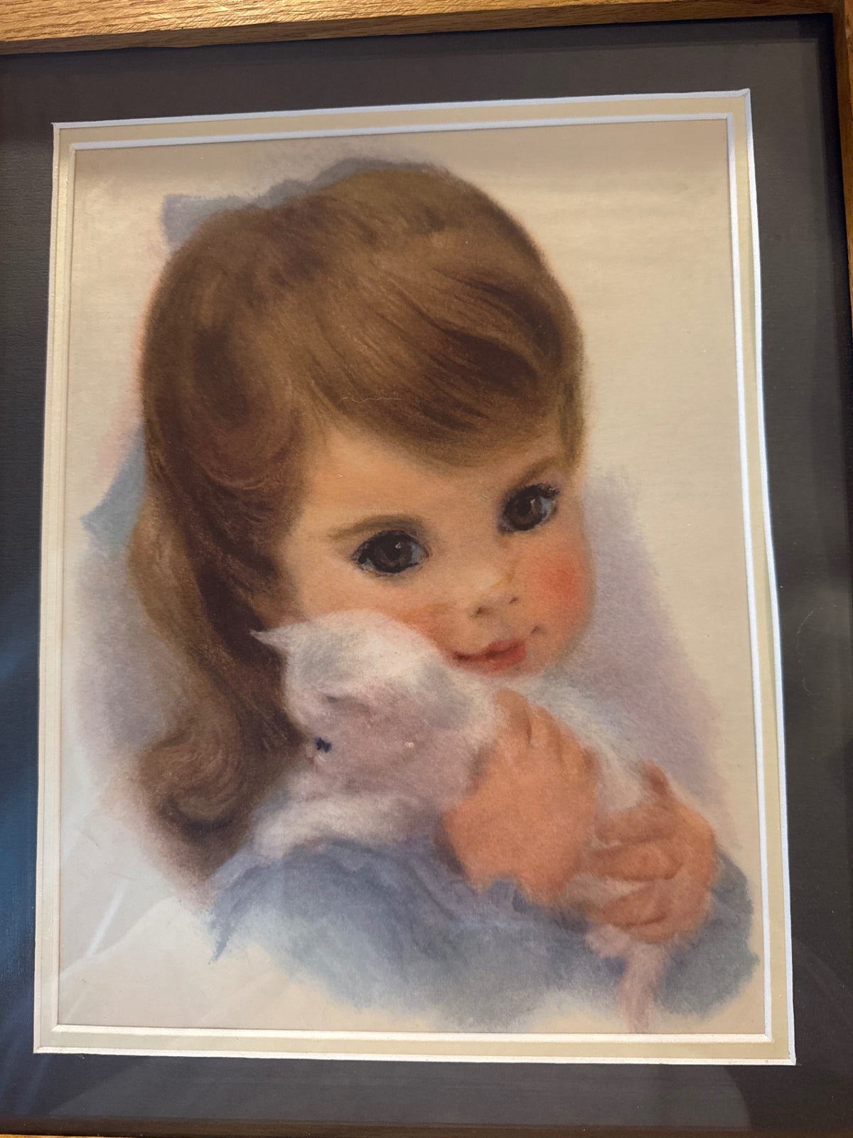 Vintage little girl with kitten