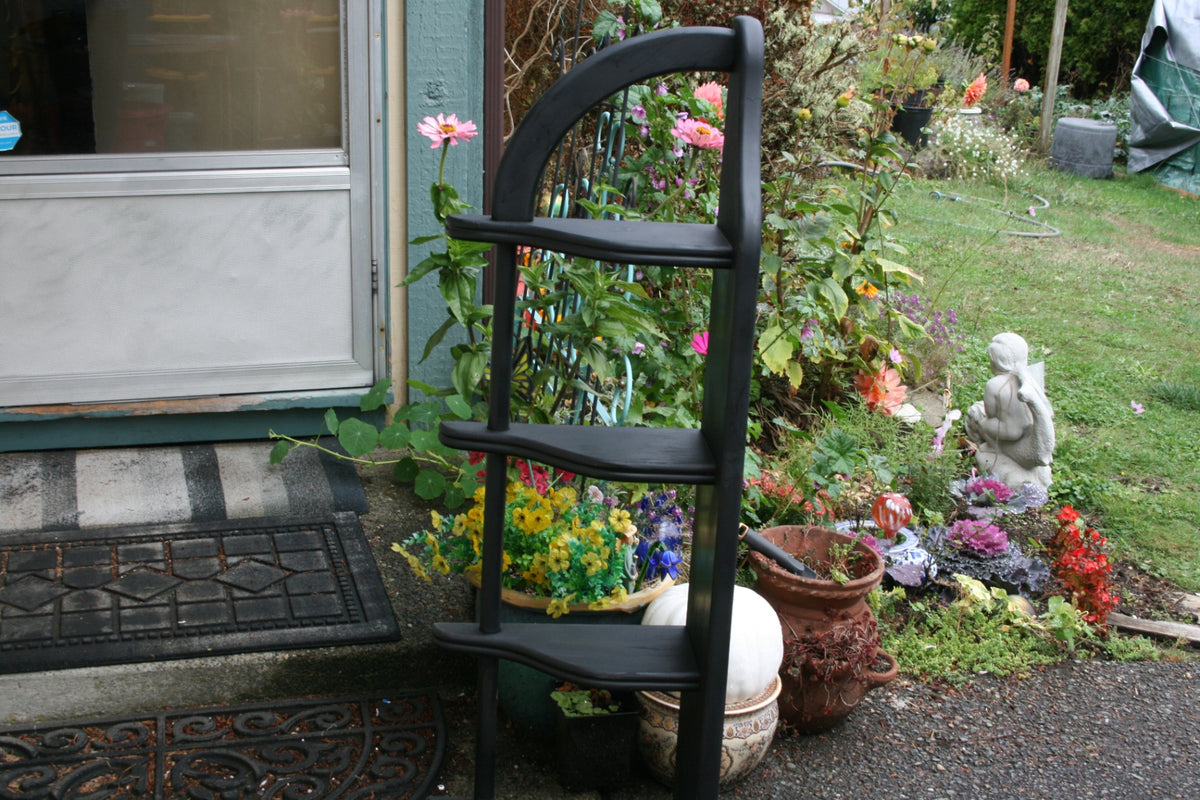 Black wooden corner shelf