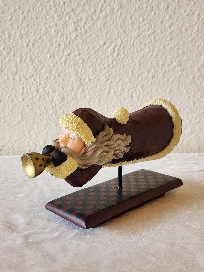 Flying Santa with Golden Horn